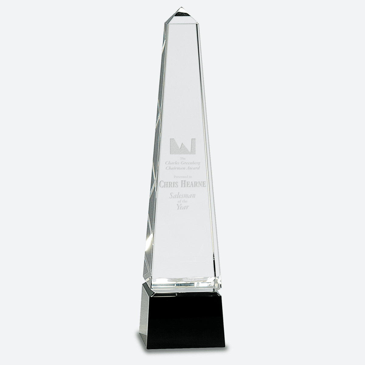 Obelisk Crystal on Black Pedestal Base