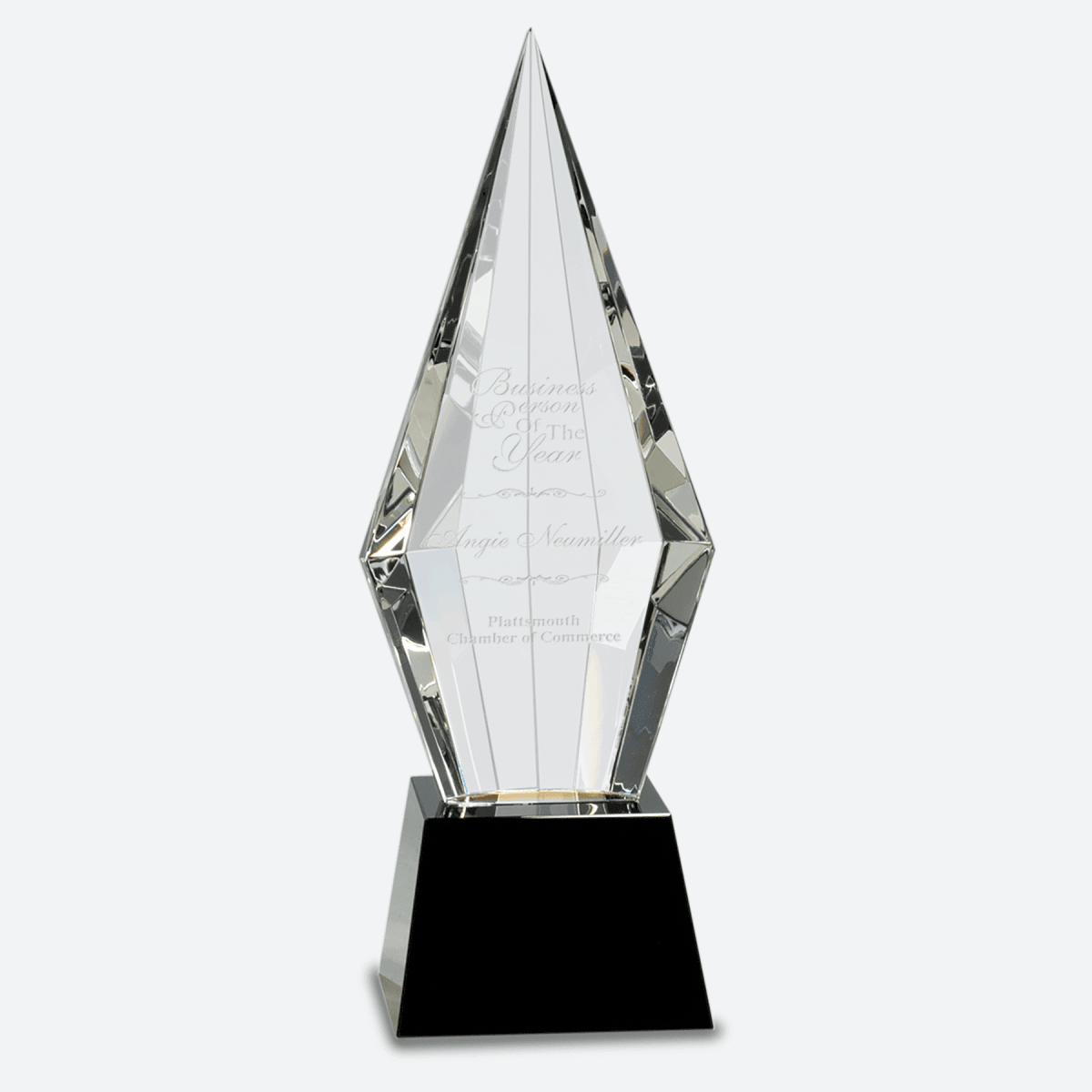 Obelisk Facet Crystal on Black Pedestal Base
