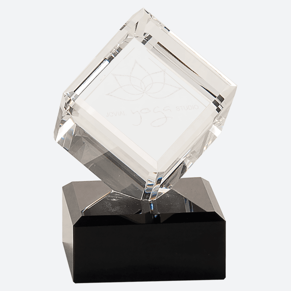 Clear Crystal Cube on Black Pedestal Base