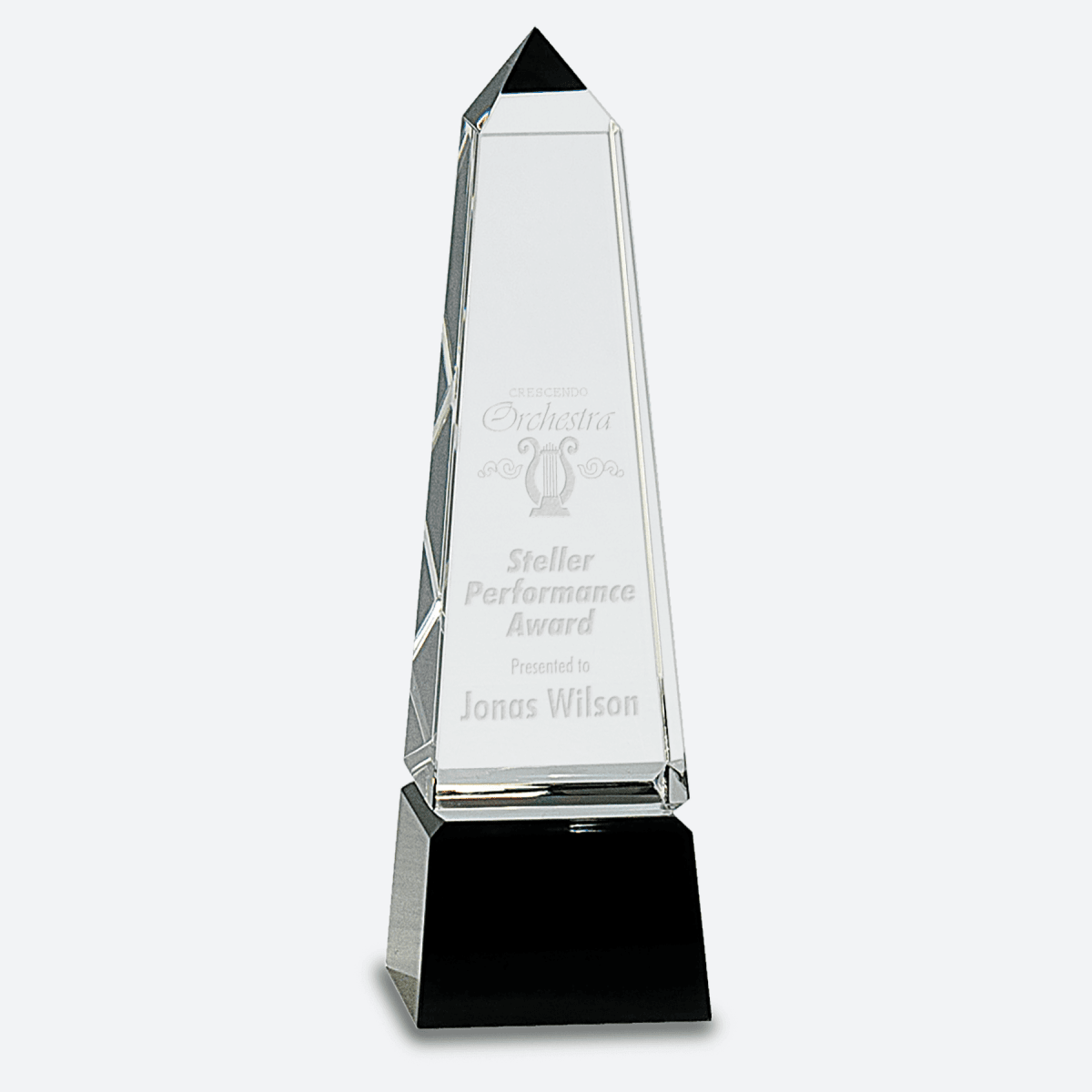Obelisk Crystal on Black Pedestal Base