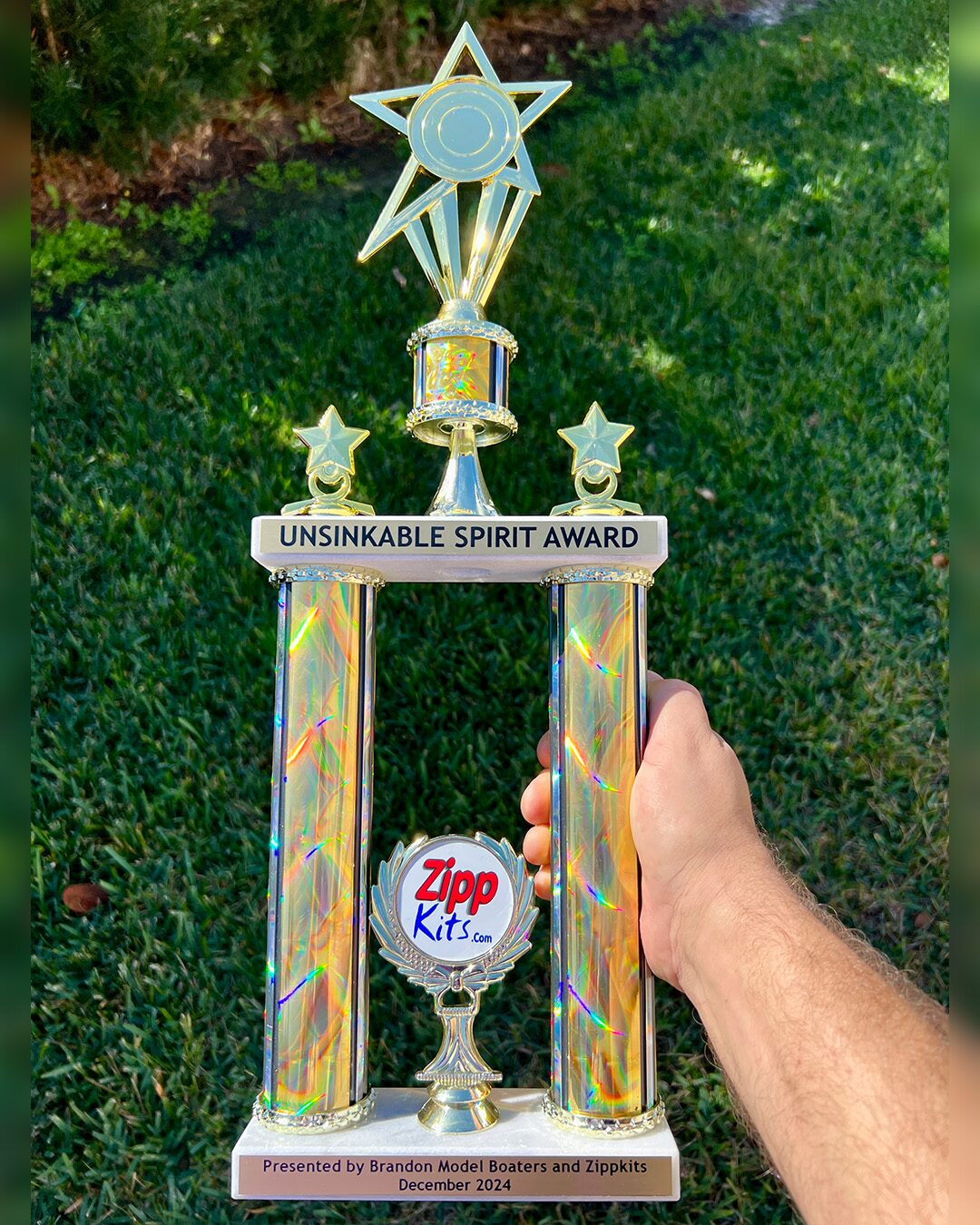 Gold two-tier double-column trophy